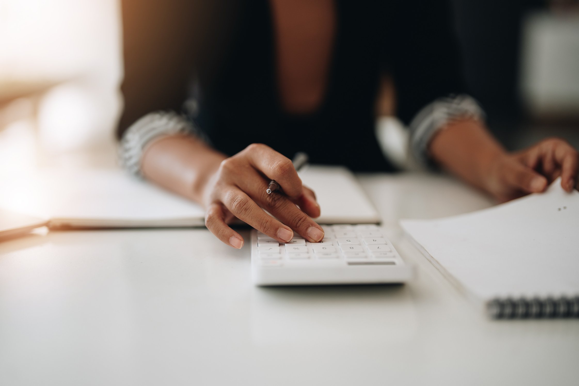 Close up view of bookkeeper or financial inspector hands mak